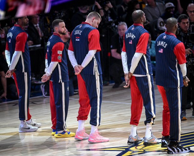 Nikola Jokic (15) of the Denver Nuggets stands with teammates Paul George (13) of the LA Clippers, Steph Curry (30) of the Golden State Warriors, Kevin Durant (35) of the Phoenix Suns and LeBron James (23) of the Los Angeles Lakers during the NBA All-Star game at Gainbridge Fieldhouse in Indianapolis, Indiana on Sunday, Feb. 18, 2024. (Photo by AAron Ontiveroz/The Denver Post)