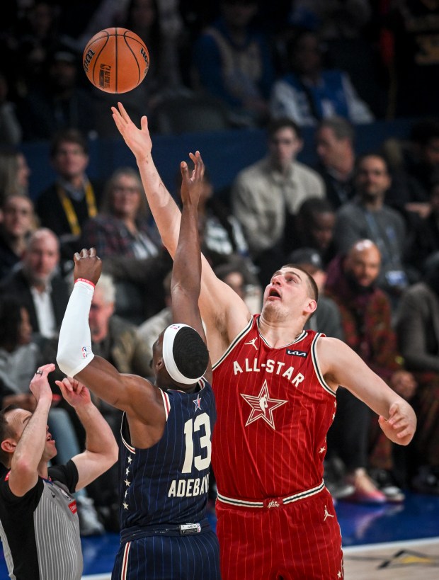 Nikola Jokic (15) of the Denver Nuggets beats Bam Adebayo (13) of the Miami Heat for possession during the NBA All-Star game at Gainbridge Fieldhouse in Indianapolis, Indiana on Sunday, Feb. 18, 2024. (Photo by AAron Ontiveroz/The Denver Post)