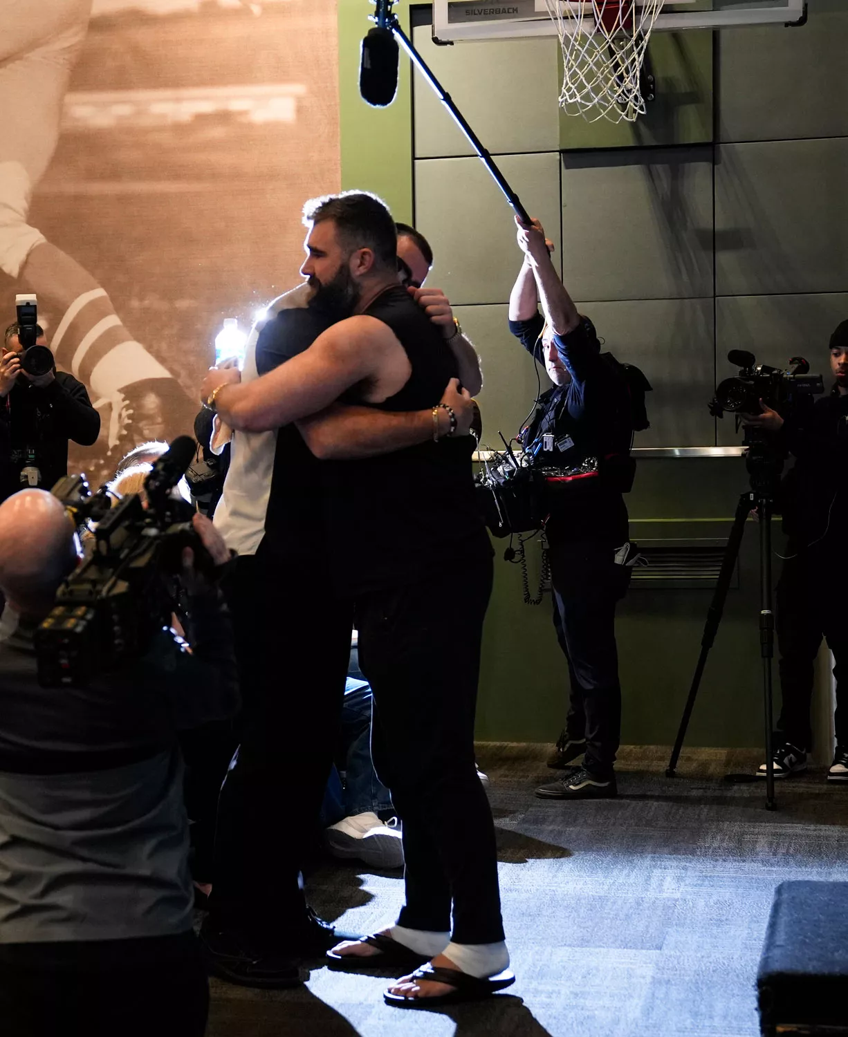 Philadelphia Eagles' Jason Kelce embraces his brother, Kansas City Chiefs' Travis Kelce, after an NFL football press conference announcing his retirement in Philadelphia, Monday, March 4, 2024