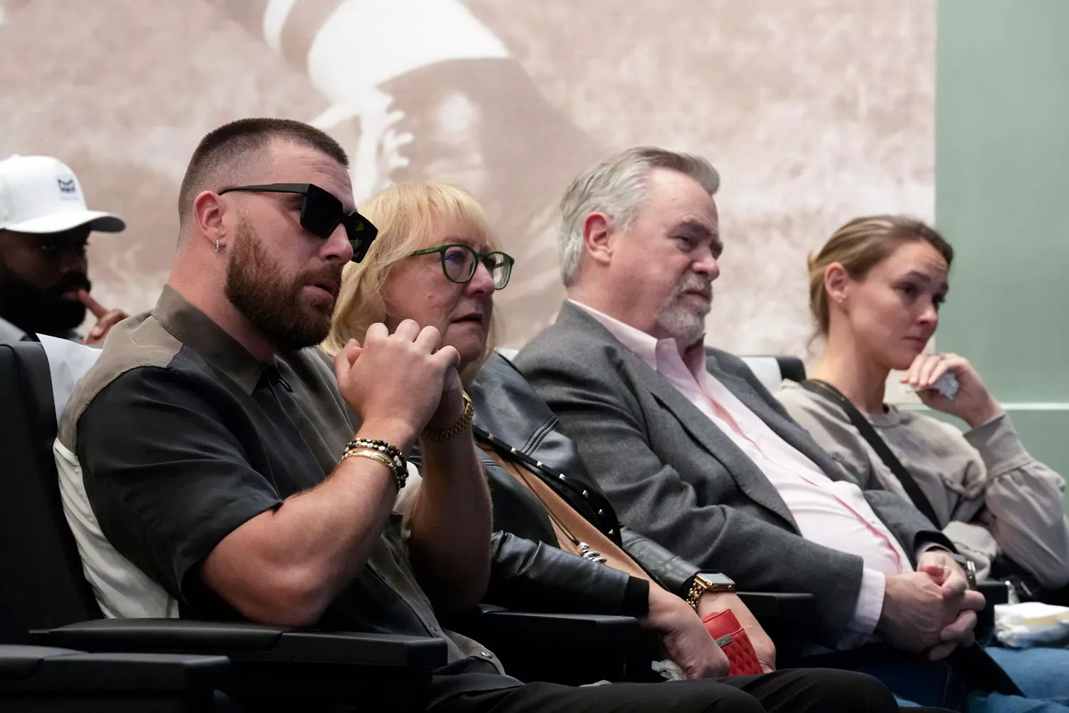 Philadelphia Eagles' Jason Kelce's family, from left, Kansas City Chiefs' Travis Kelce, mother, Donna Kelce, father, Ed Kelce, and wife, Kylie McDevitt Kelce, listens as Jason Kelce announces his retirement at an NFL football press conference in Philadelphia, Monday, March 4, 2024