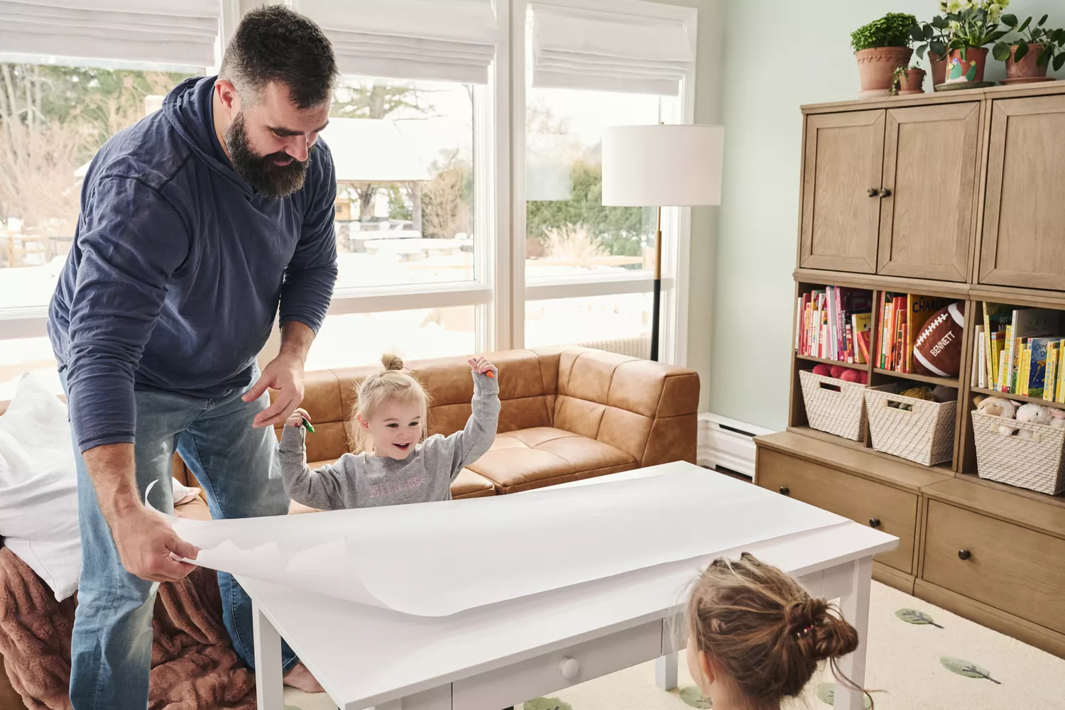 Jason and Kylie Kelce Share Laughs with Their Three Daughters as They Reveal Playroom Makeover