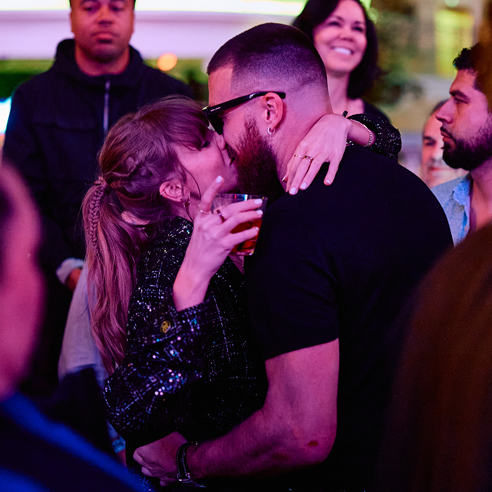 Taylor Swift and Travis Kelce Share Celebratory Kiss inside DJ Booth at XS Nightclub inside Wynn Las Vegas on Feb. 11, 2024. 