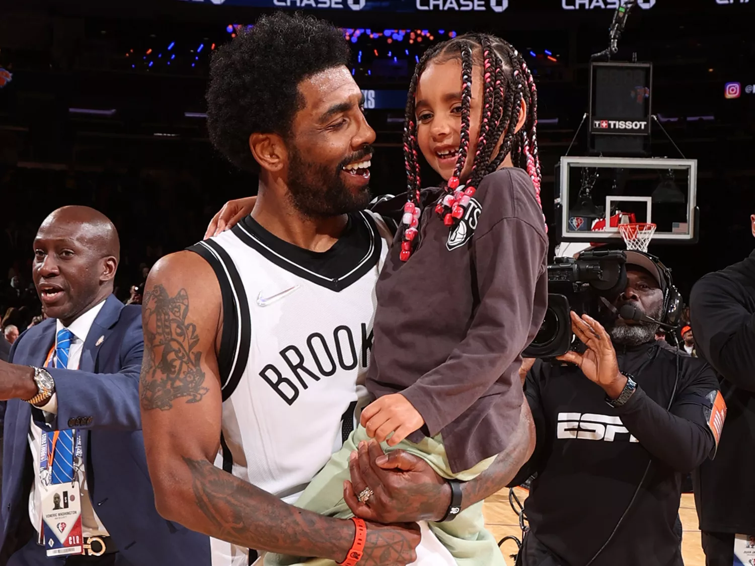 Kyrie Irving with his daughter, Azurie Elizabeth Irving after a game in 2022