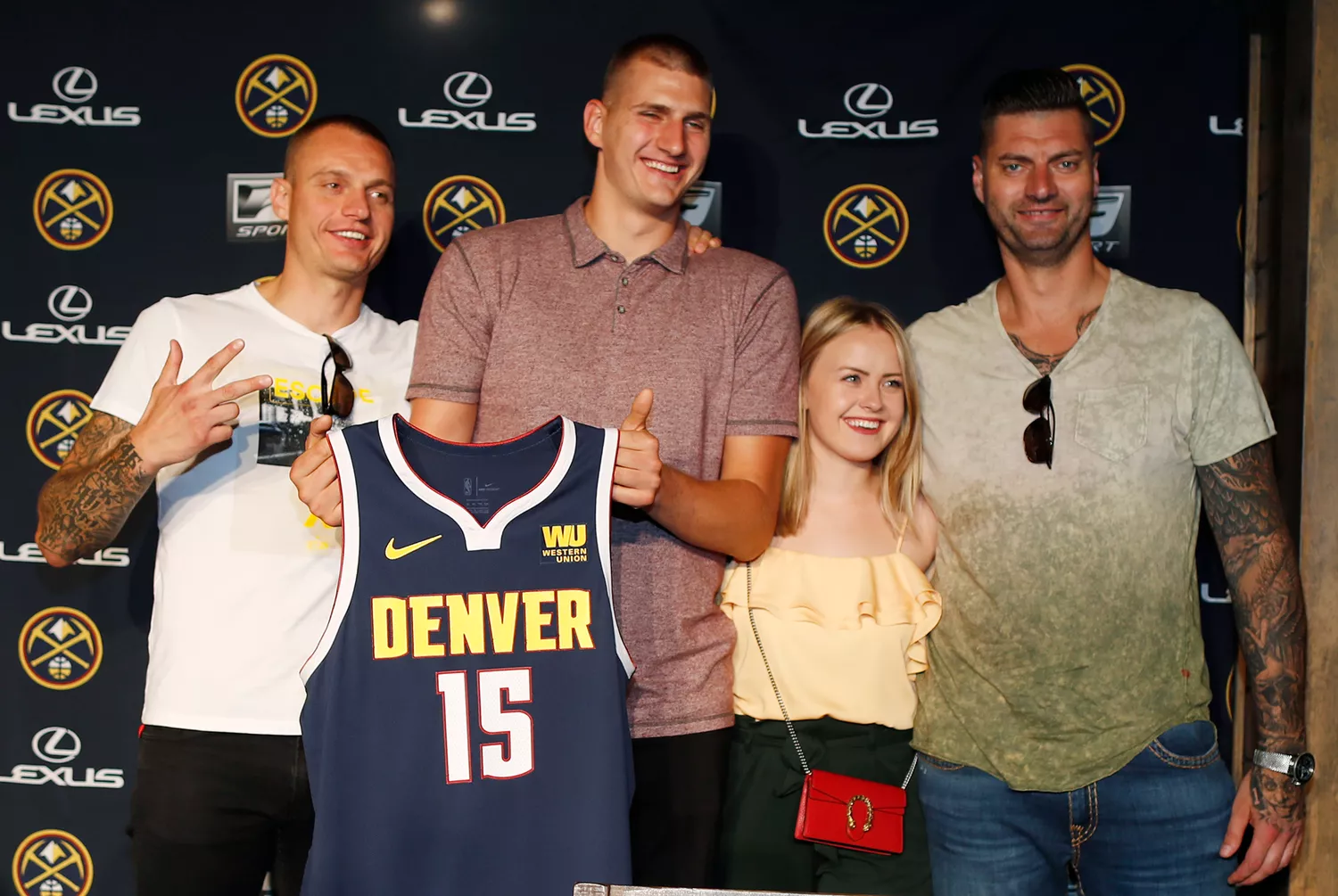 Nikola Jokic, of Serbia, with his girlfriend, Natalija Macesic, and his brothers