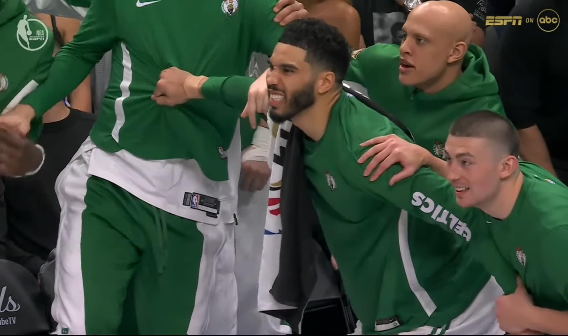 May be an image of 3 people, people playing basketball, crowd and text