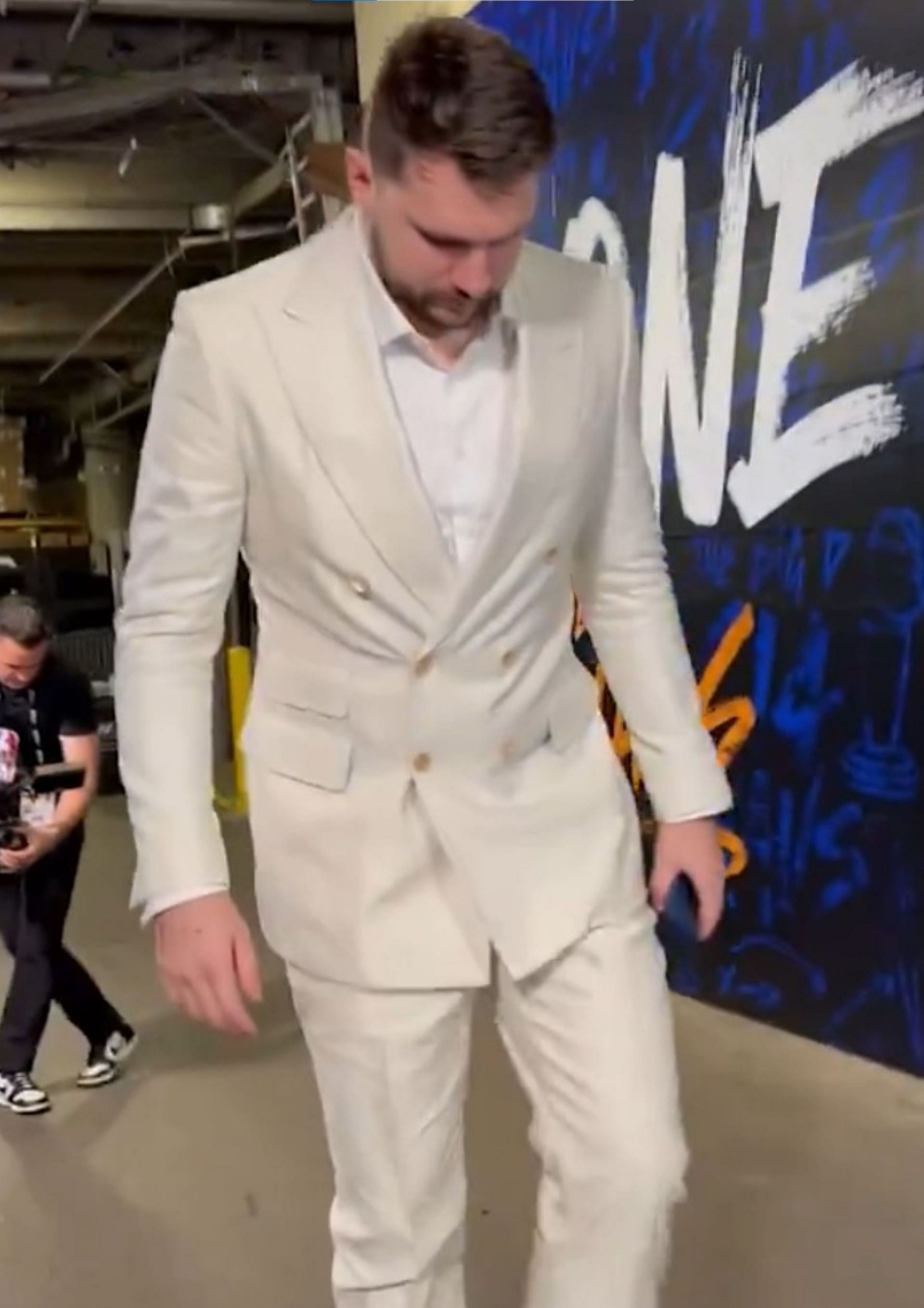 Doncic wears an all-white suit for Game 3.