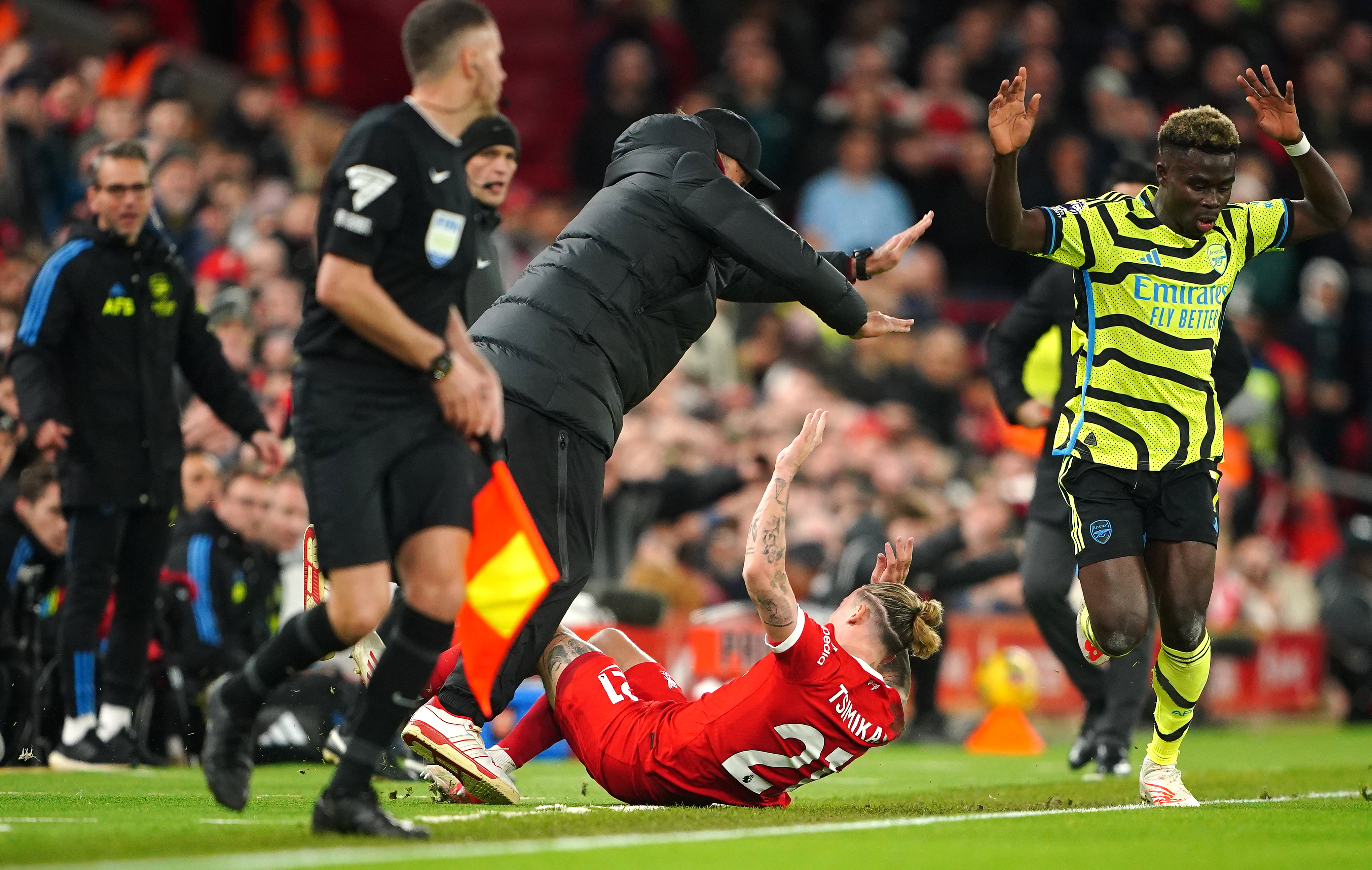 Kostas Tsimikas collided with Liverpool boss Jurgen Klopp after eating shoulder barge by Bukayo Saka