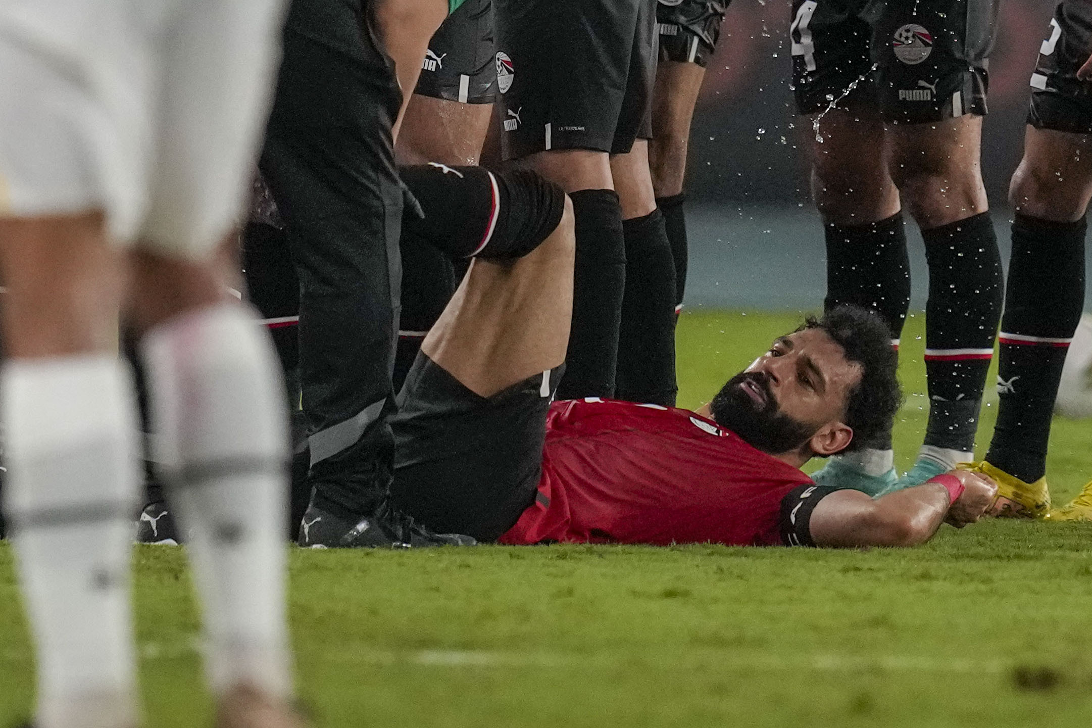 Salah was holding his hamstring before going down