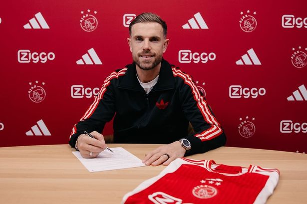 Jordan Henderson signs his Ajax contract