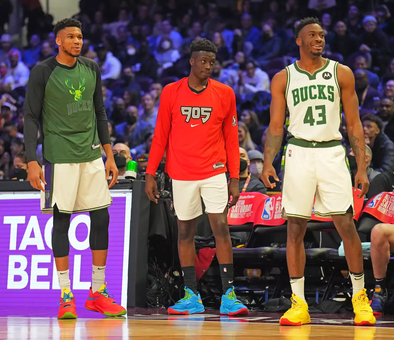Thanasis Antetokounmpo #43, Giannis Antetokounmpo #34 of the Milwaukee Bucks and Alexc Antetokounmpo of Raptors 905 look on during the Taco Bell Skills Challenge as part of 2022 NBA All Star Weekend on February 19, 2022 at Rocket Mortgage FieldHouse in Cleveland, Ohio.