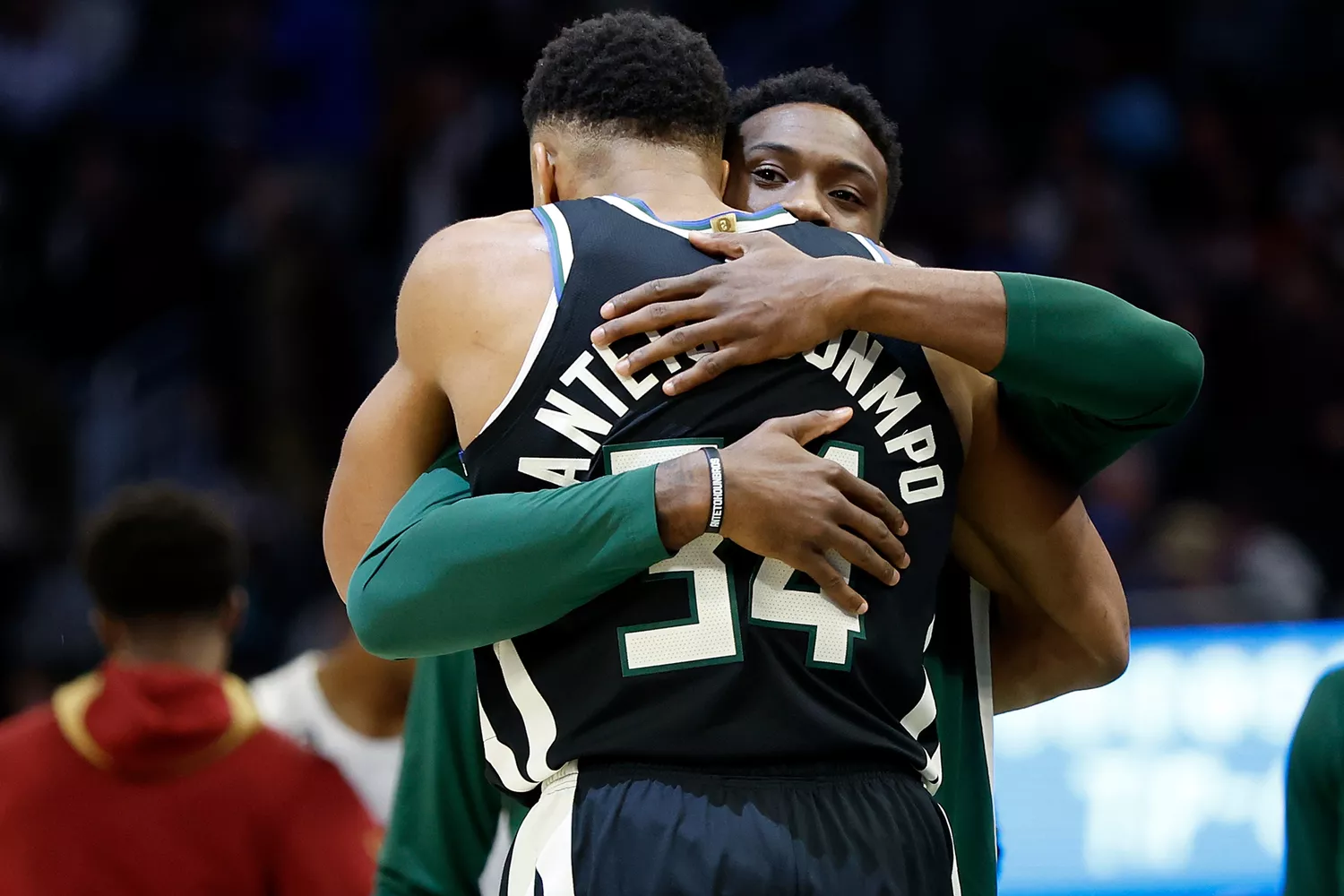 Giannis Antetokounmpo #34 of the Milwaukee Bucks hugs his brother Thanasis Antetokounmpo #43 of the Milwaukee Bucks before the start of game against the Cleveland Cavaliers at Fiserv Forum on November 25, 2022 in Milwaukee, Wisconsin.