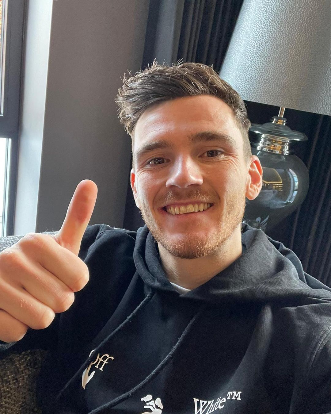 Liverpool defender Andy Robertson has moved into Sir Alex Ferguson's road