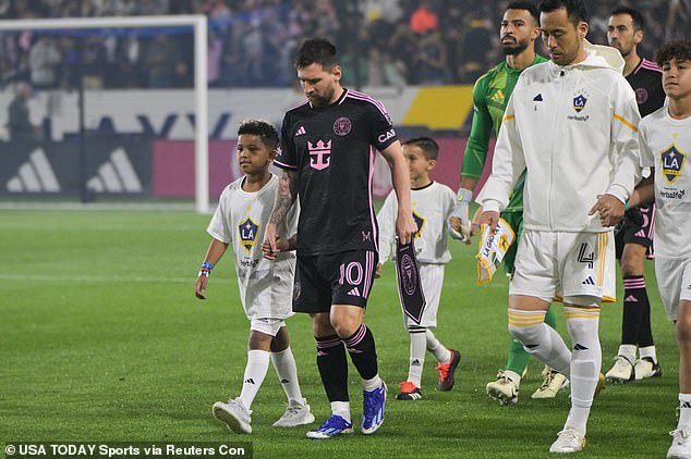 Messi walking out with Kim Kardashian's son, Saint West, before Inter Miami's draw against the LA Galaxy on Sunday