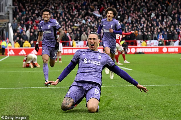 Darwin Nunez celebrates after netting Liverpool's 99th minute winner against Forest