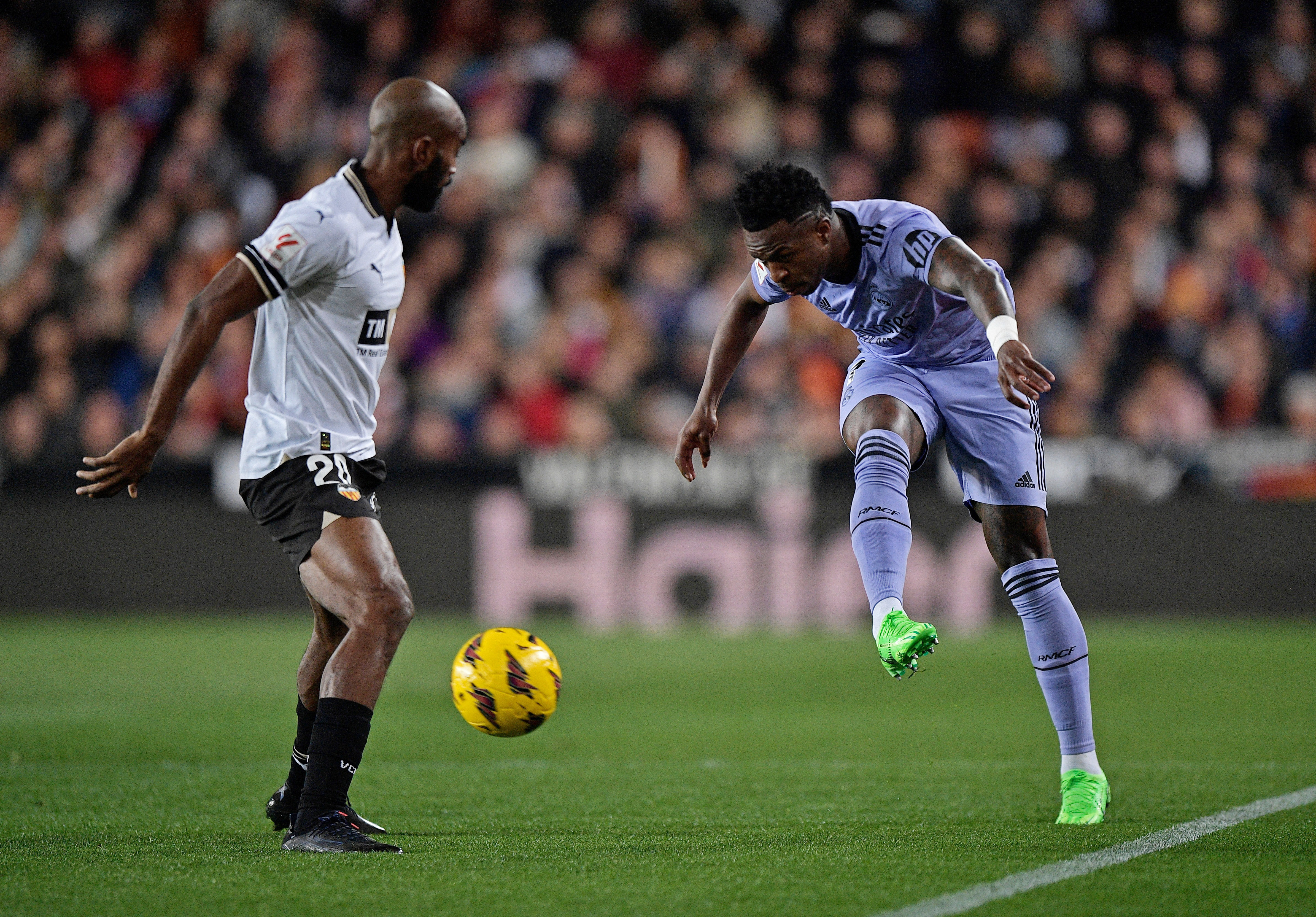 Vinicius scores twice as Real fight back to draw at Valencia | Reuters