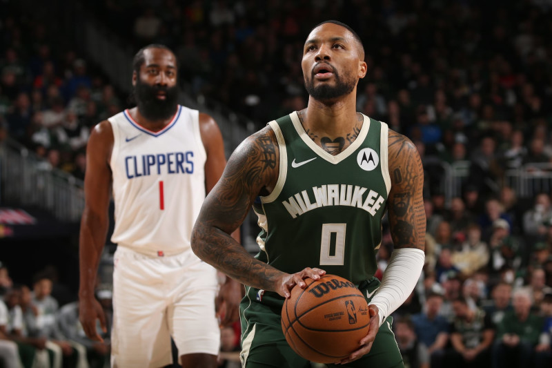 MILWAUKEE, WI - MARCH 4: Damian Lillard #0 of the Milwaukee Bucks shoots a free throw during the game against the LA Clippers on March 4, 2024 at the Fiserv Forum Center in Milwaukee, Wisconsin. NOTE TO USER: User expressly acknowledges and agrees that, by downloading and or using this Photograph, user is consenting to the terms and conditions of the Getty Images License Agreement. Mandatory Copyright Notice: Copyright 2024 NBAE (Photo by Gary Dineen/NBAE via Getty Images).