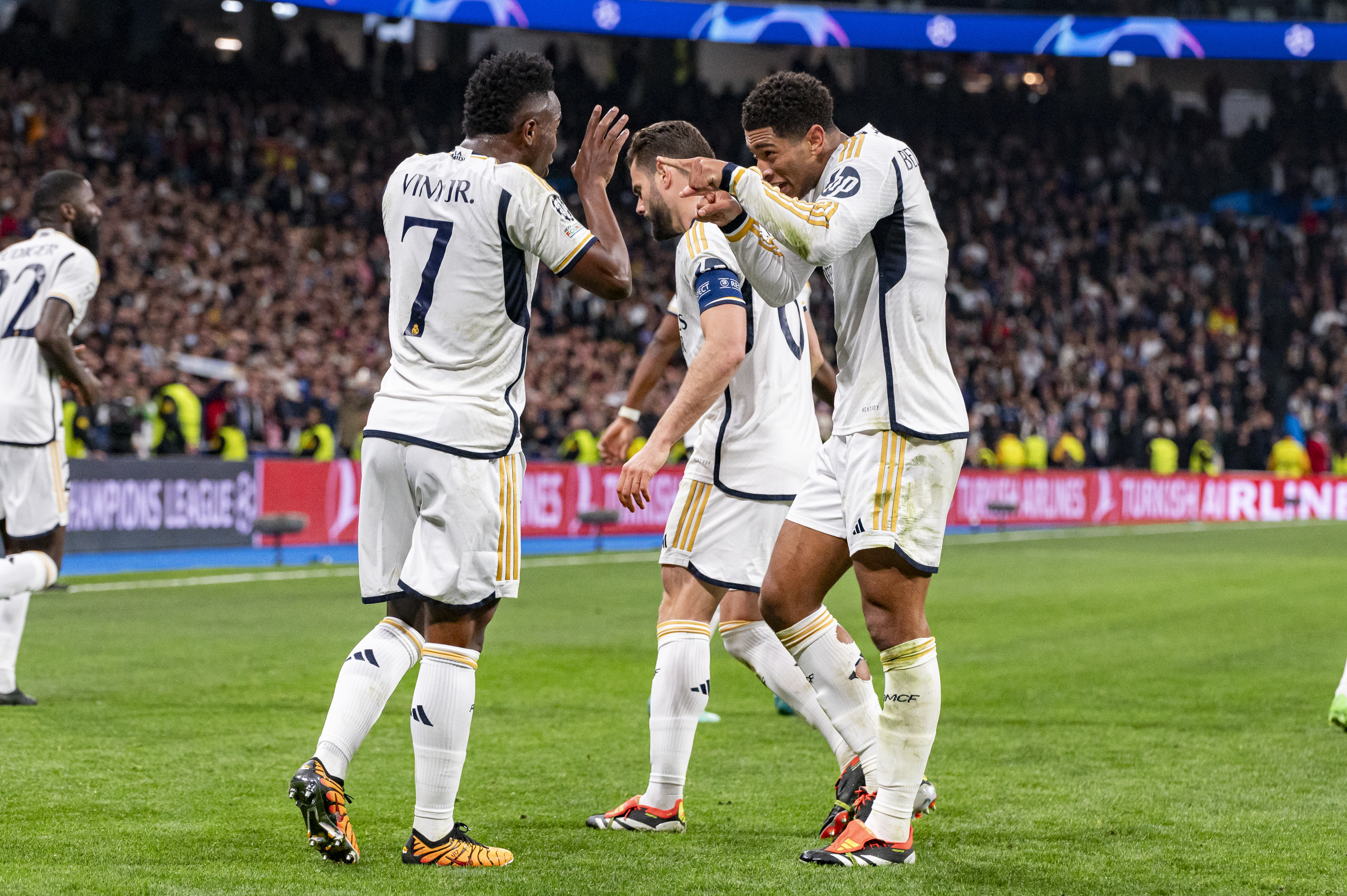 Jude Bellingham helps Real scorer Vinicius Junior celebrate