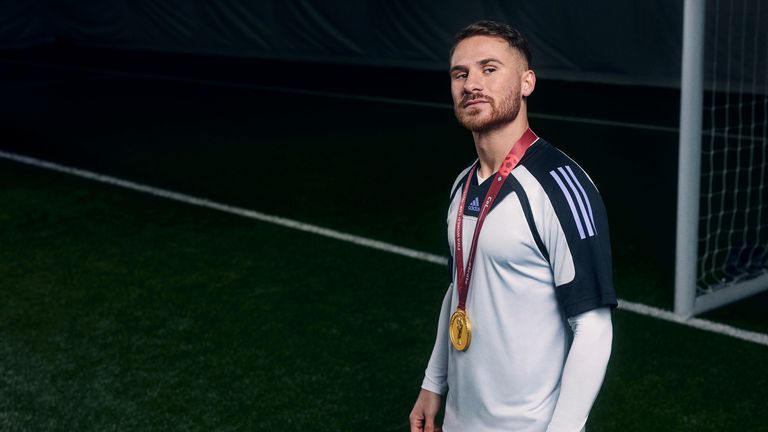 Brighton&#39;s Alexis Mac Allister with his World Cup medal for Argentina at an adidas shoot