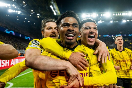 Ian Maatsen celebrates with his teammates Marcel Sabitzer and Jadon Sancho