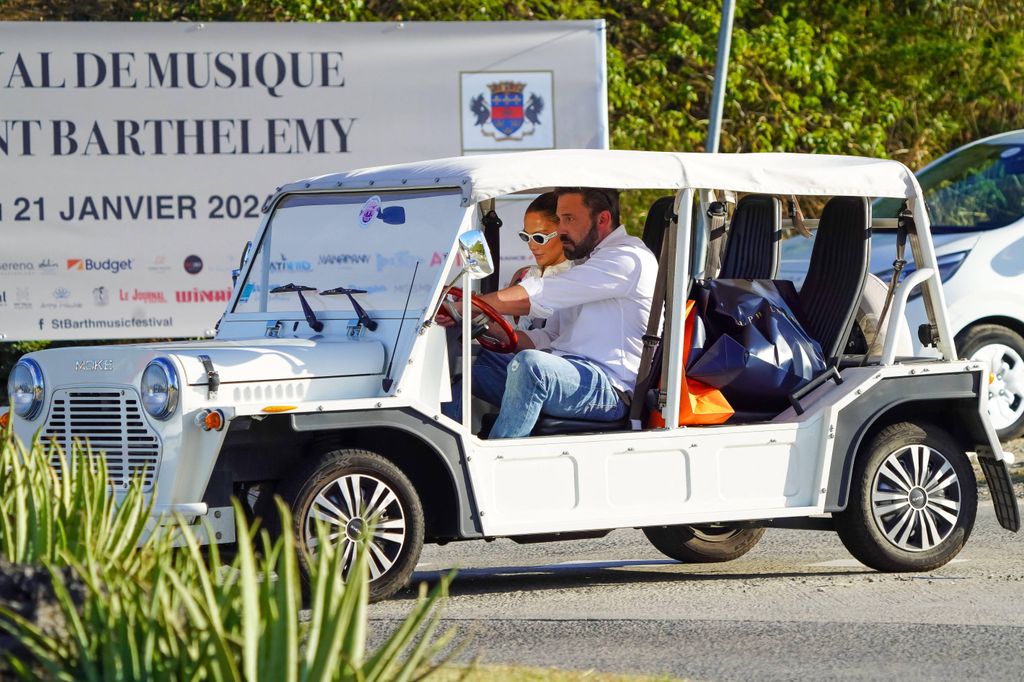 Jennifer Lopez and Ben Affleck squeeze themselves and their shopping into a mini moke