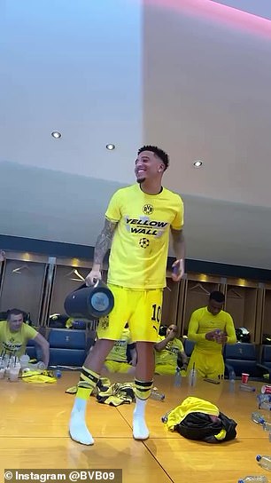 Jadon Sancho led the dressing room celebrations after helping Borussia Dortmund to the Champions League final
