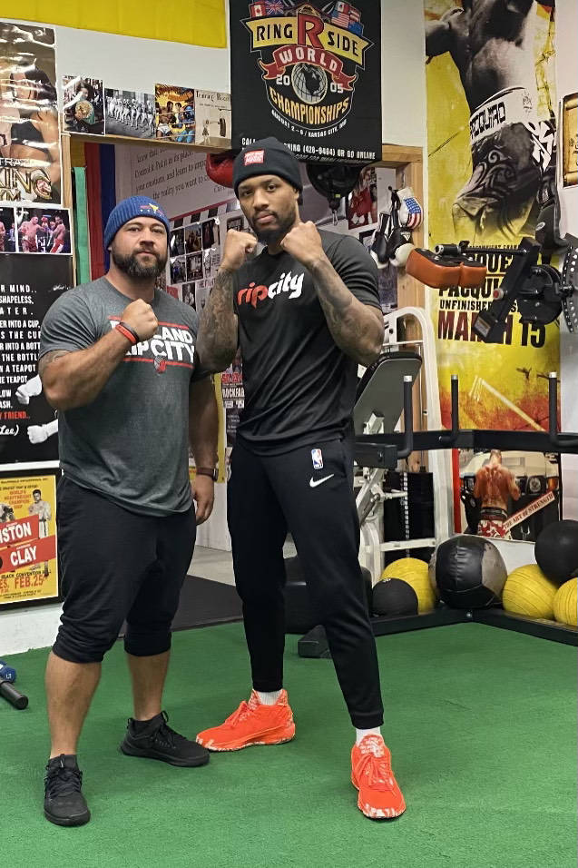 Portland Trailblazers point guard Damian Lillard poses for a photo with his boxing trainer, Cem … | Las Vegas Review-Journal