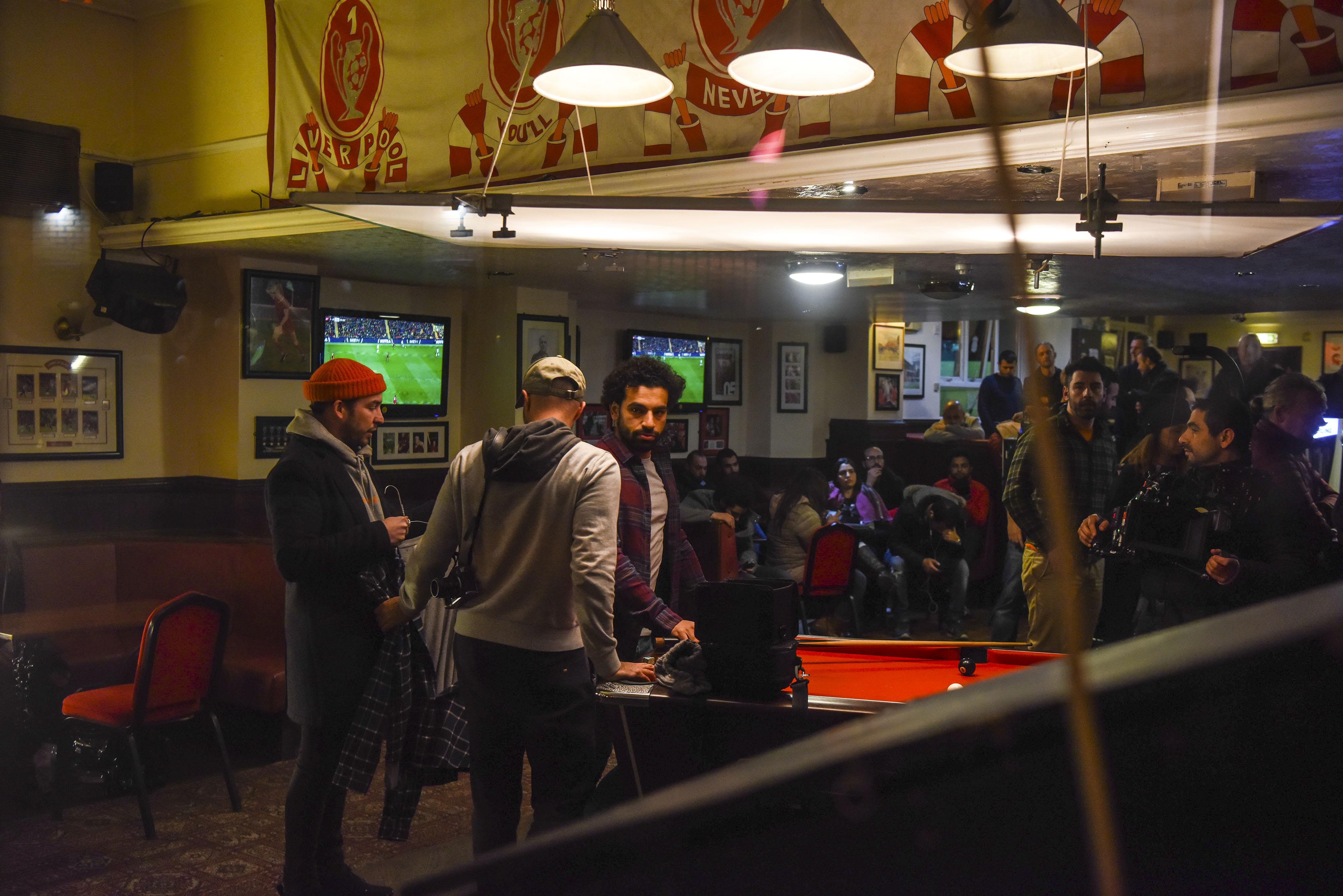  Salah also continued his filming down the pub