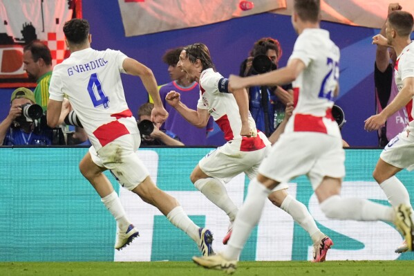 Croatia star Luka Modric becomes the oldest goal-scorer at a European  Championship | AP News