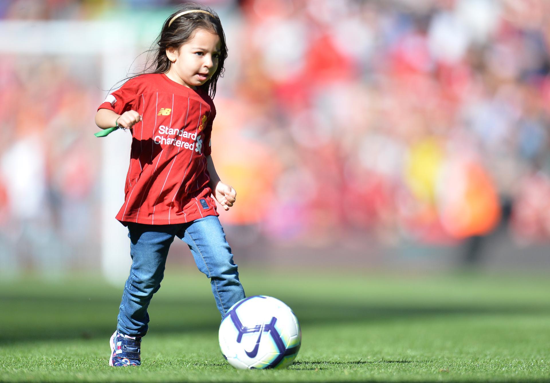 Mohamed Salah's daughters star on the pitch at Anfield - in pictures