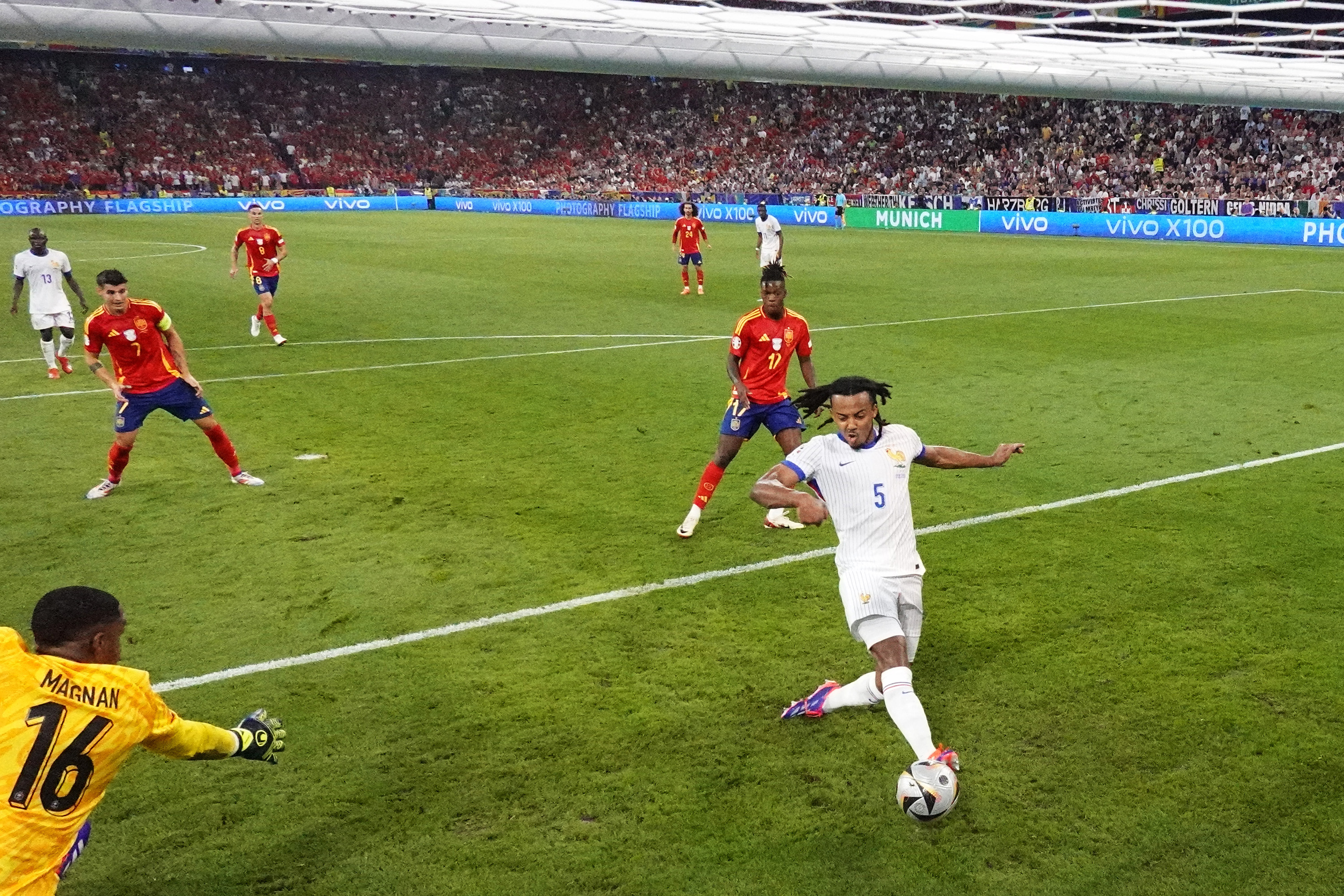 France defender Jules Kounde could not do enough to divert Olmo's shot away from goal