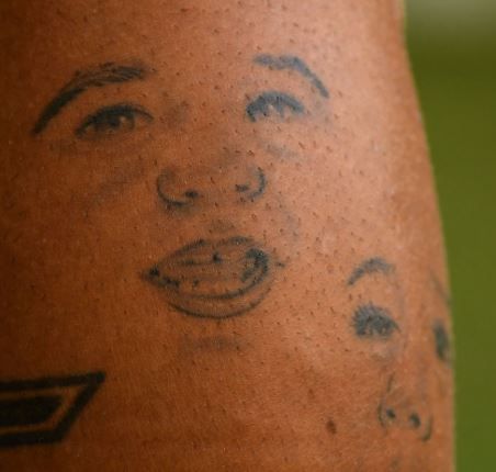 Roberto Firmino faces tattoo 1