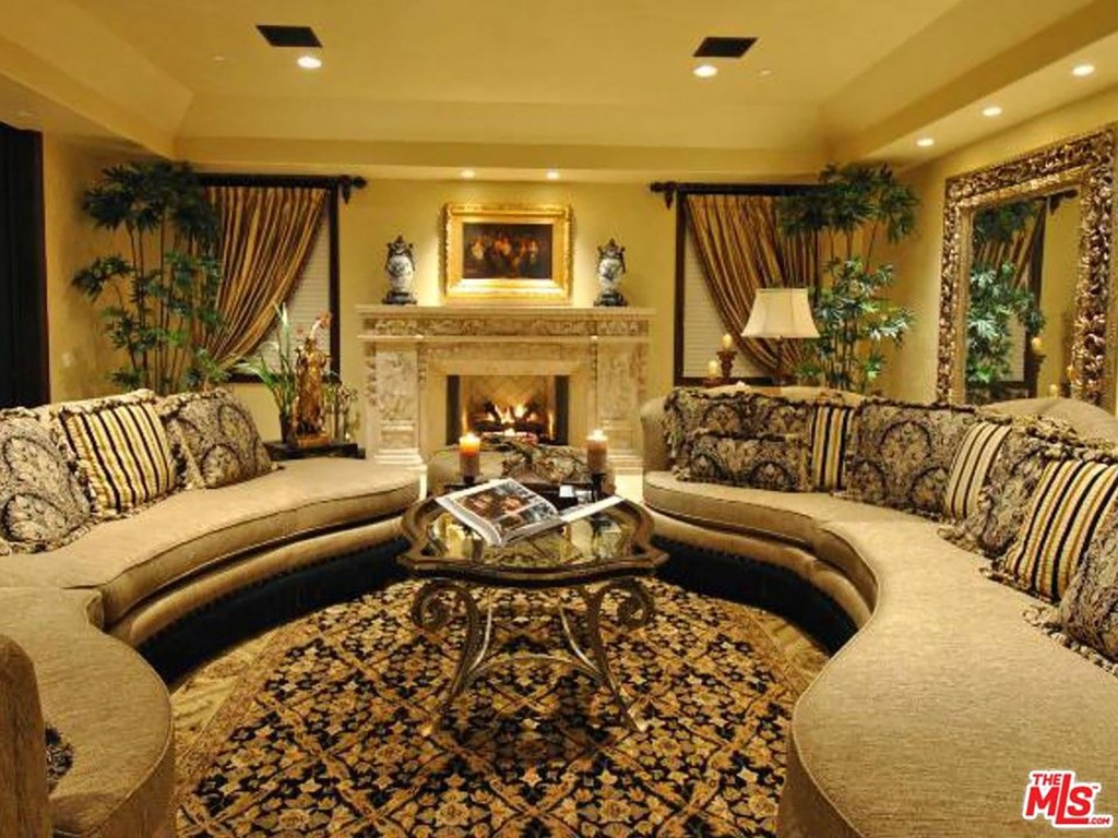 The formal living room with a fireplace.