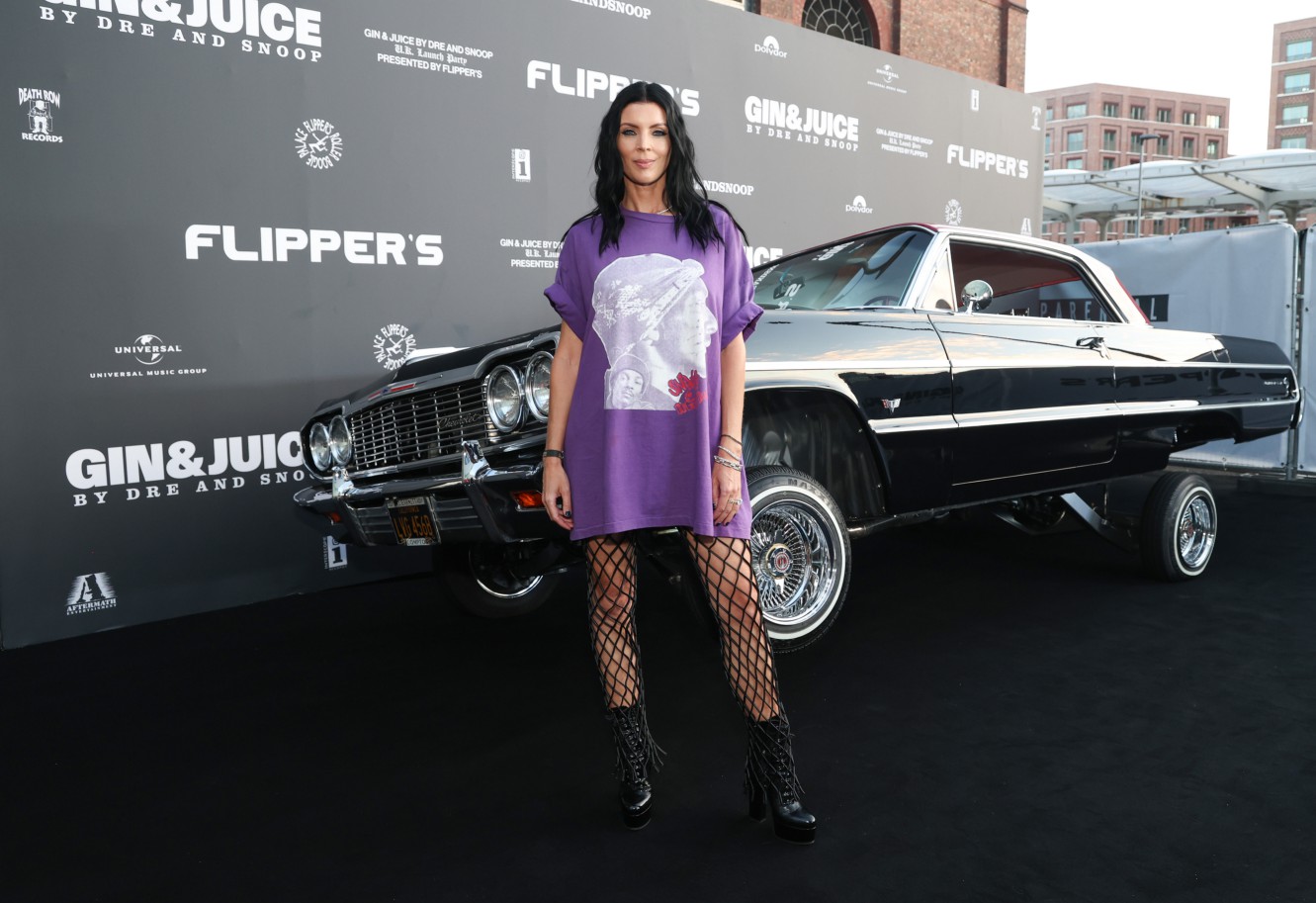 Liberty Ross wore an oversized purple shirt at the party