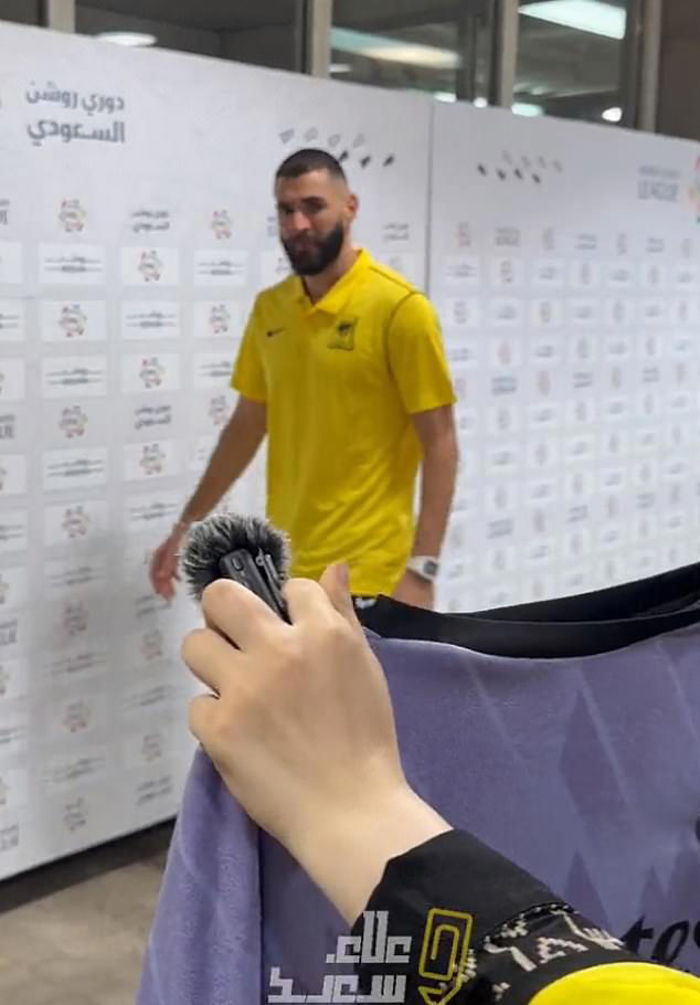 However, the 36-year-old Frenchman noticed one supporter holding up a Real Madrid shirt