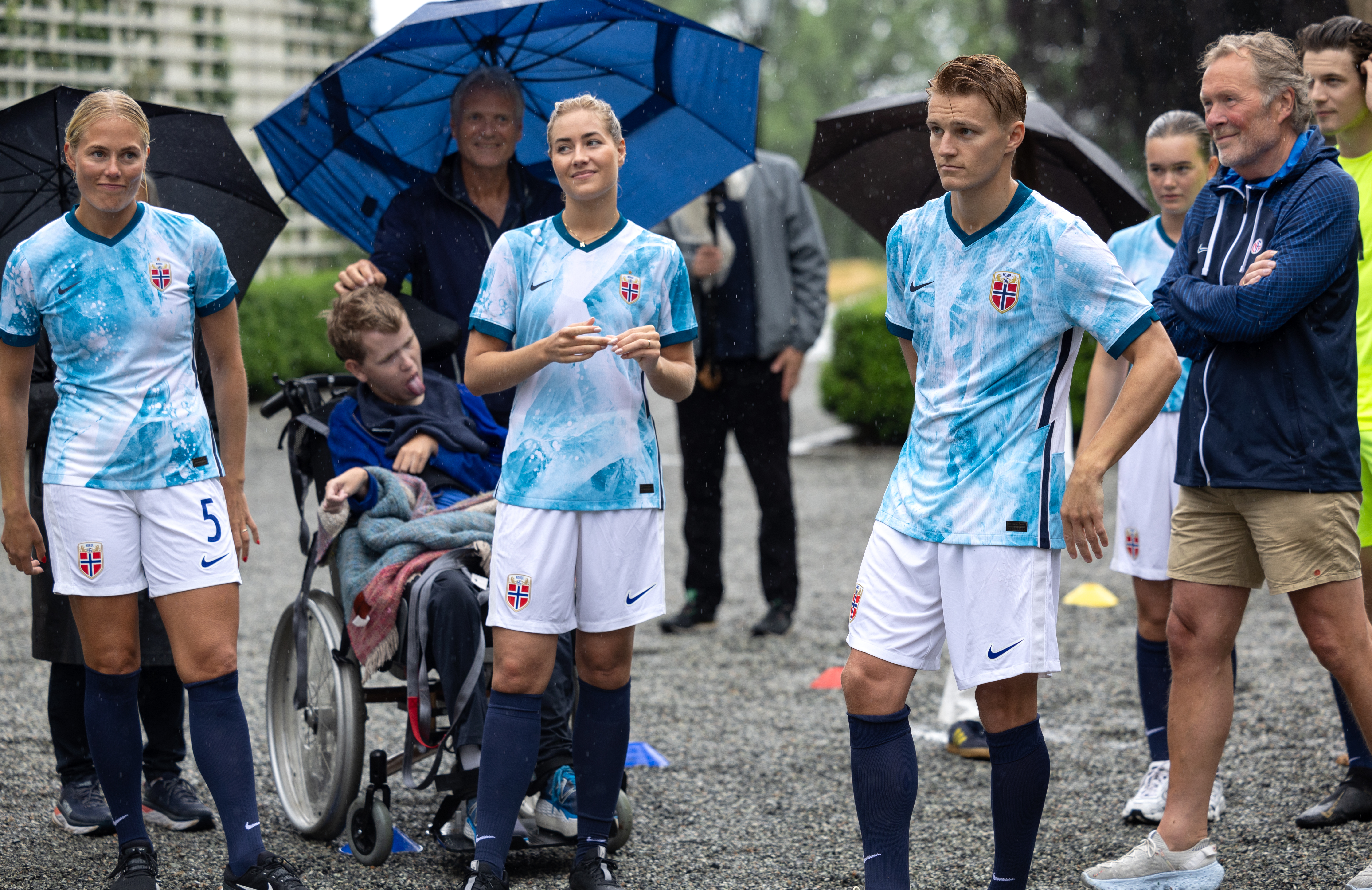 Martin Odegaard and Helene Spilling lined up alongside the Norwegian Royal Family