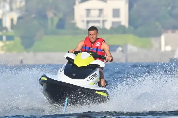 Kylian Mbappe frolics on yacht with bikini-clad babes and enjoys jet ski|  All Football