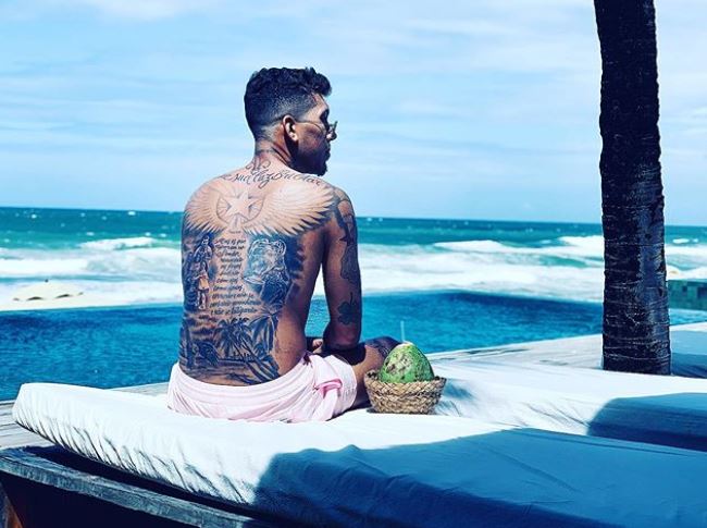  Roberto Firmino shows off his tattoos - including a special Champions League tribute