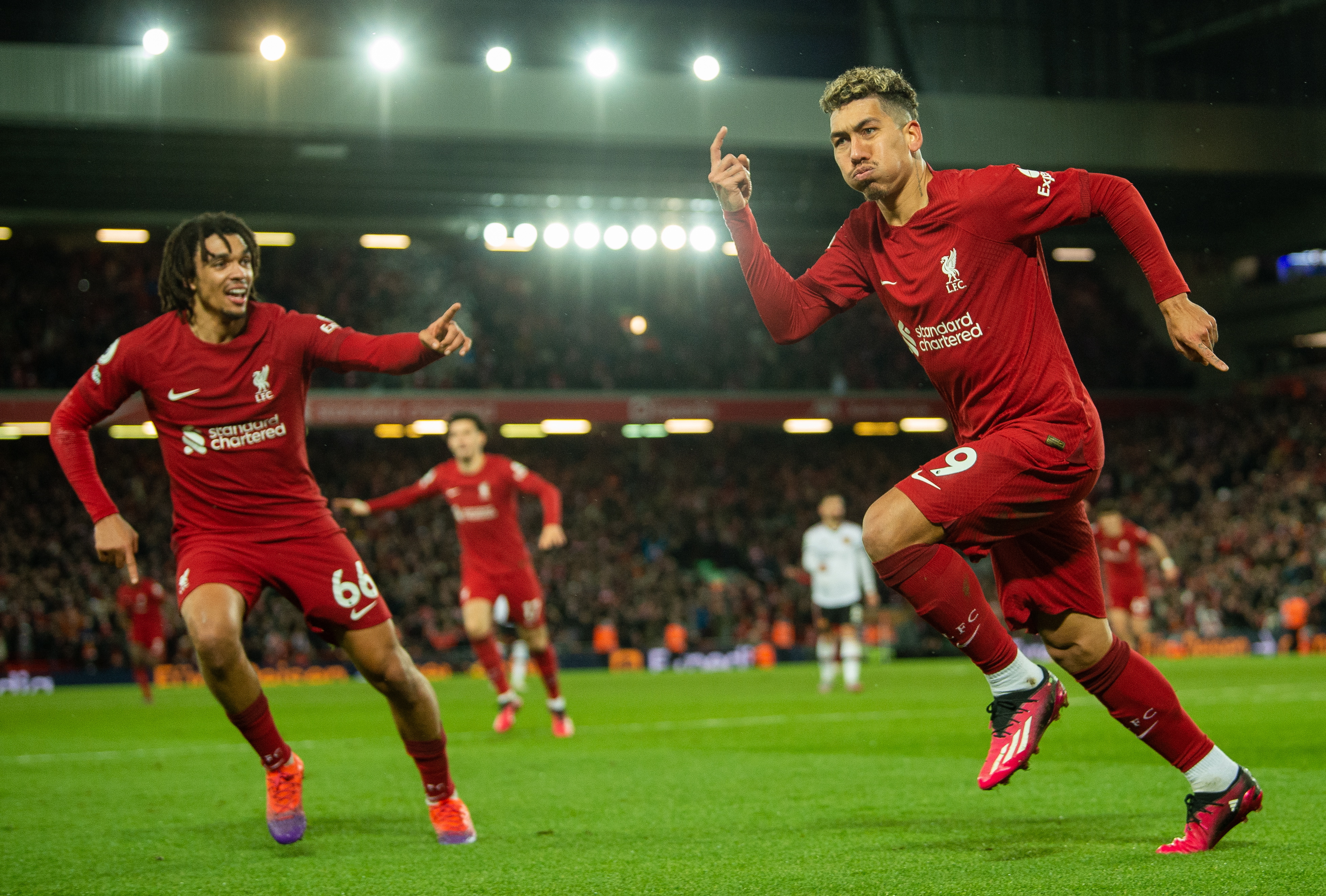 Sub Roberto Firmino celebrates netting the seventh goal against fierce rivals Man Utd and is in huge demand for when he departs in the summer