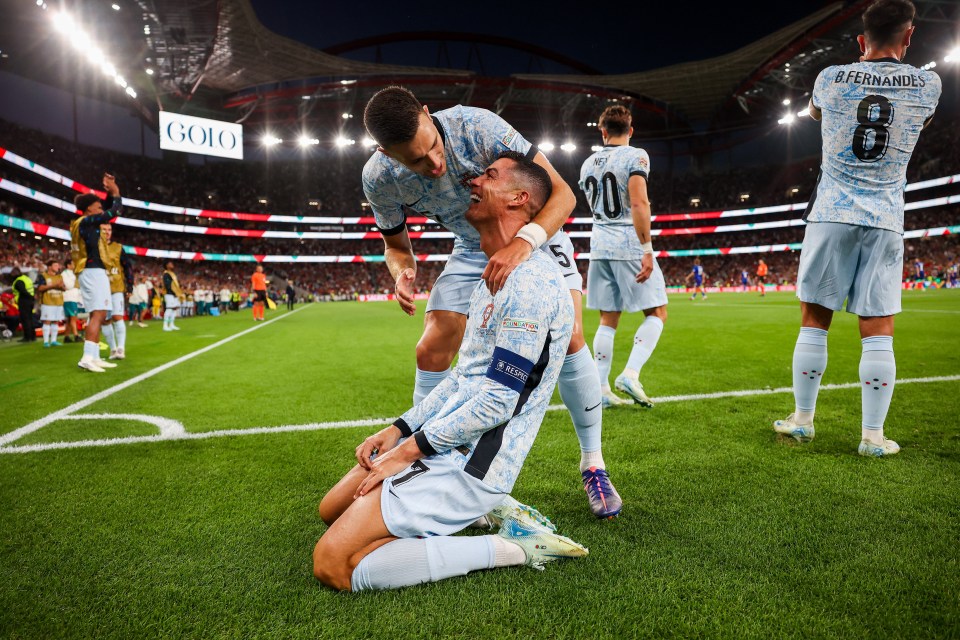 The goal machine was mobbed by Portugal team-mates