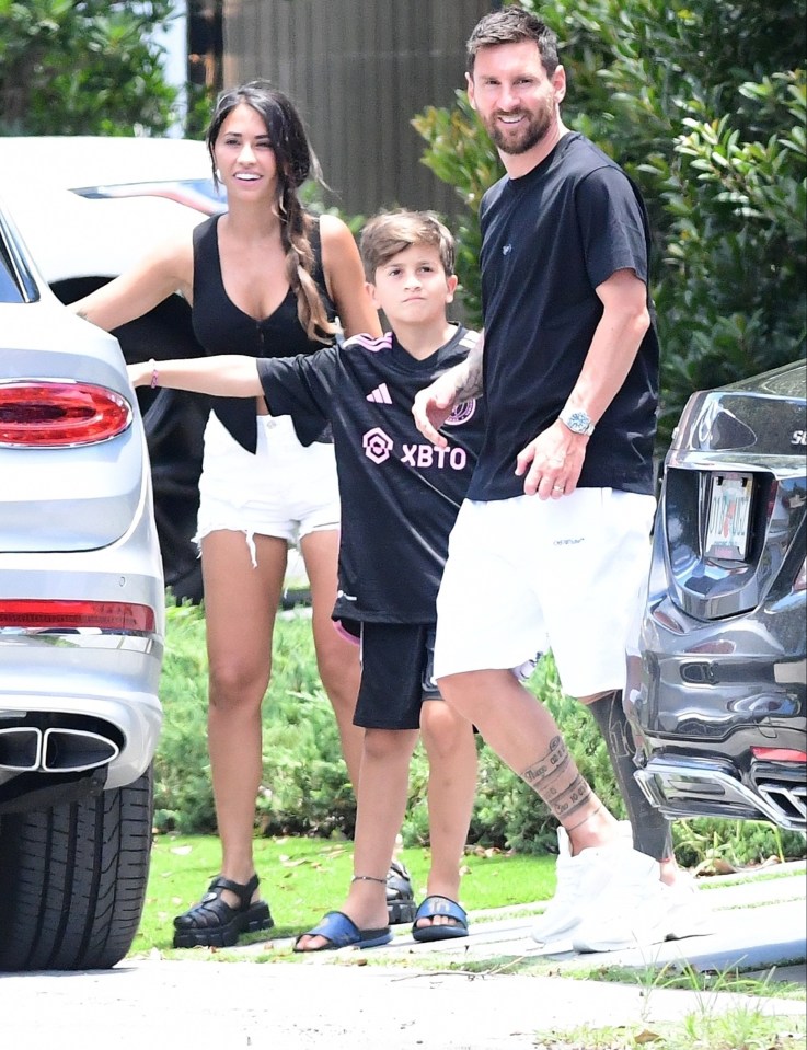 Messi was all smiles with his wife Antonela and one of his sons