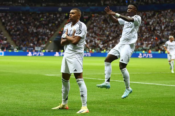 Mbappe celebrates with Vinicius Jr