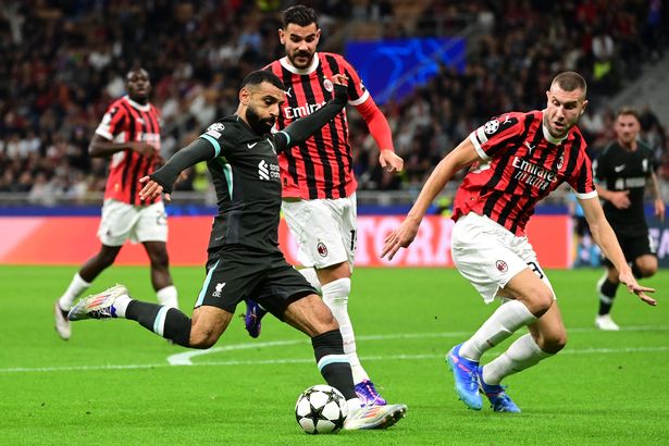 Mohamed Salah shooting during AC Milan vs Liverpool