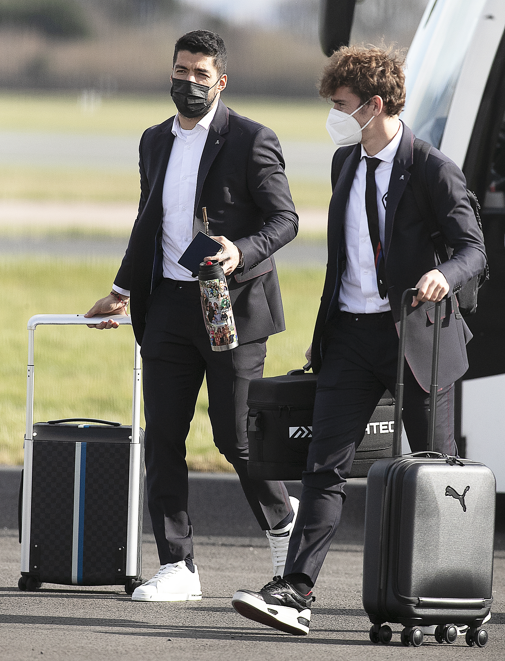 Atletico Madrid star Luis Suarez landed in Manchester with his personalised flask